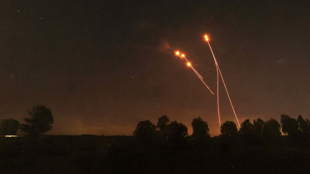 Smoke and flame rise as hostilities between Israel and Hamas escalate, in Gaza. Credit: Reuters Photo