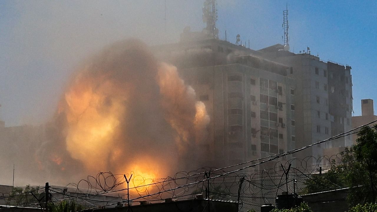 Israeli airstrike targeted and destroyed a high-rise building in Gaza City. Credit: AFP Photo