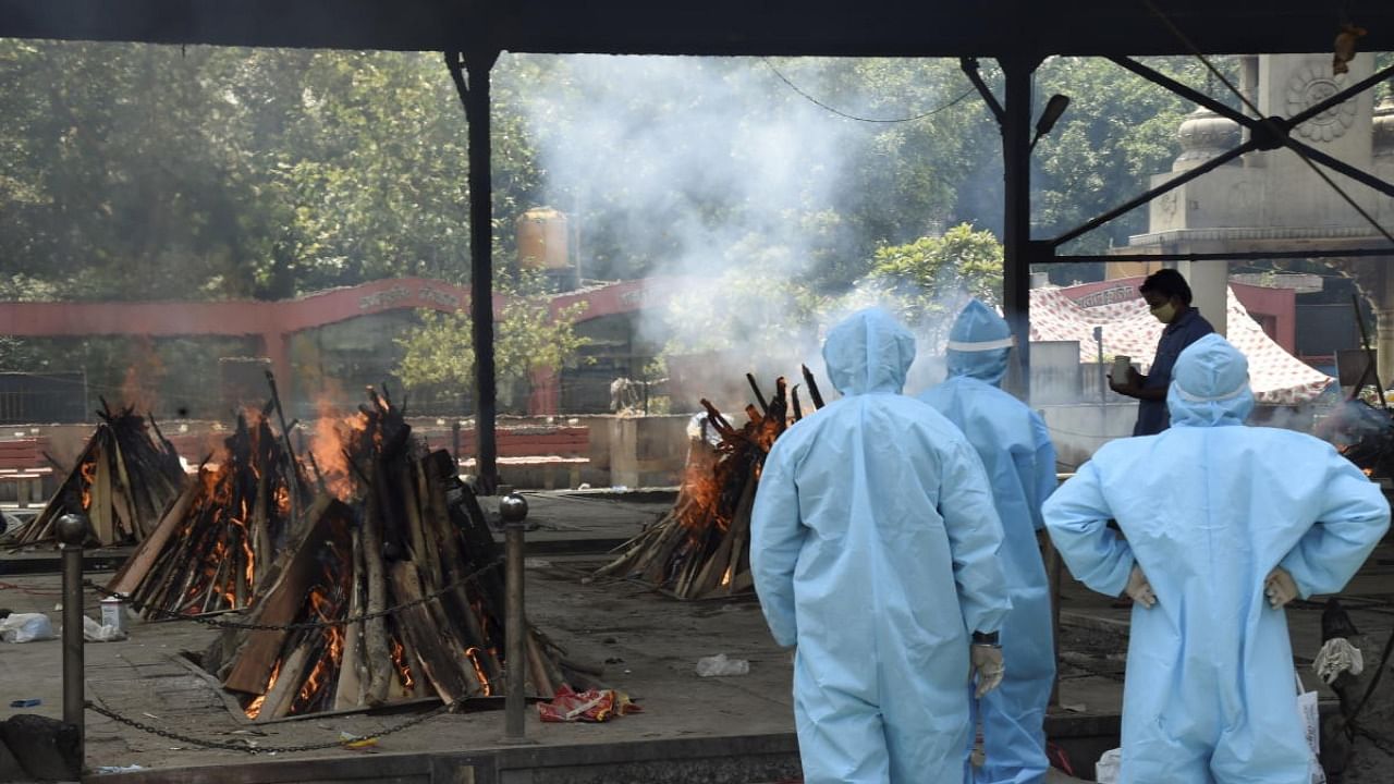 Cremation of Covid-19 deaths. Credit: PTI Photo