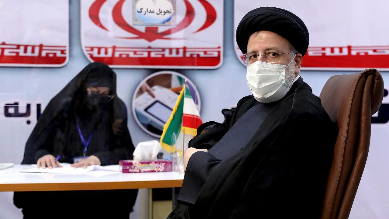 Ebrahim Raisi, head of Iran's judiciary registers his name as a candidate for the June 18 presidential elections at the interior Ministry in Tehran. Credit: AP/PTI Photo