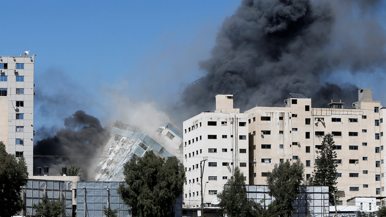 an Israeli airstrike that targeted and destroyed a high-rise building in Gaza City that housed offices of The Associated Press and other media outlets. Credit: Reuters Photo