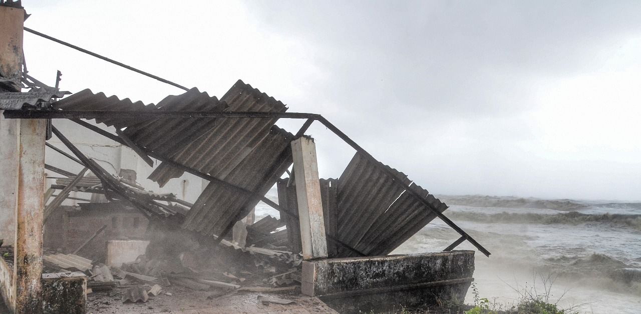 Damaged roof of a structure due to heavy winds as Cyclone Tauktae forms in the Arabian Sea. Credit: PTI Photo