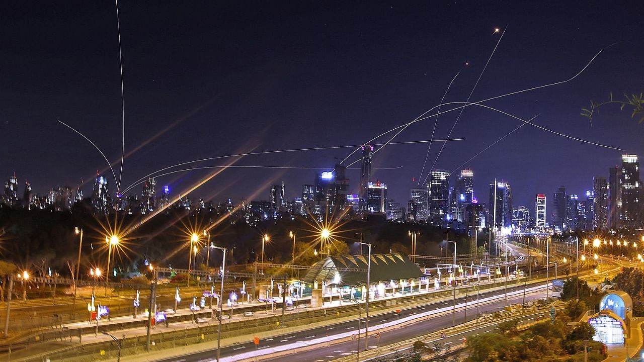Israel's Iron Dome air defence system intercepts rockets above the coastal city of Tel Aviv. Credit: AFP Photo