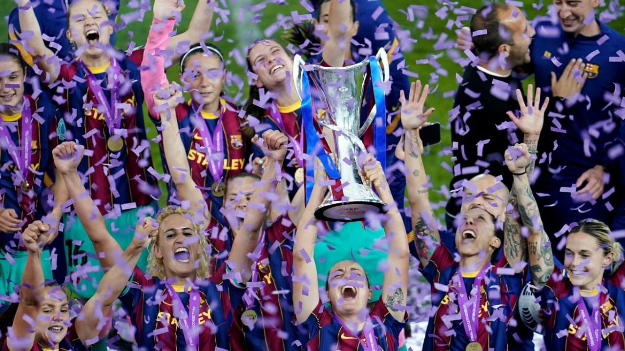  Barcelona players celebrate winning the Women's Champions League. Credit: Reuters Photo