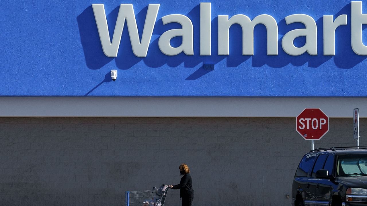 A shopper enters a Walmart on October 24, 2020 in El Paso, Texas. Credit: AFP File Photo