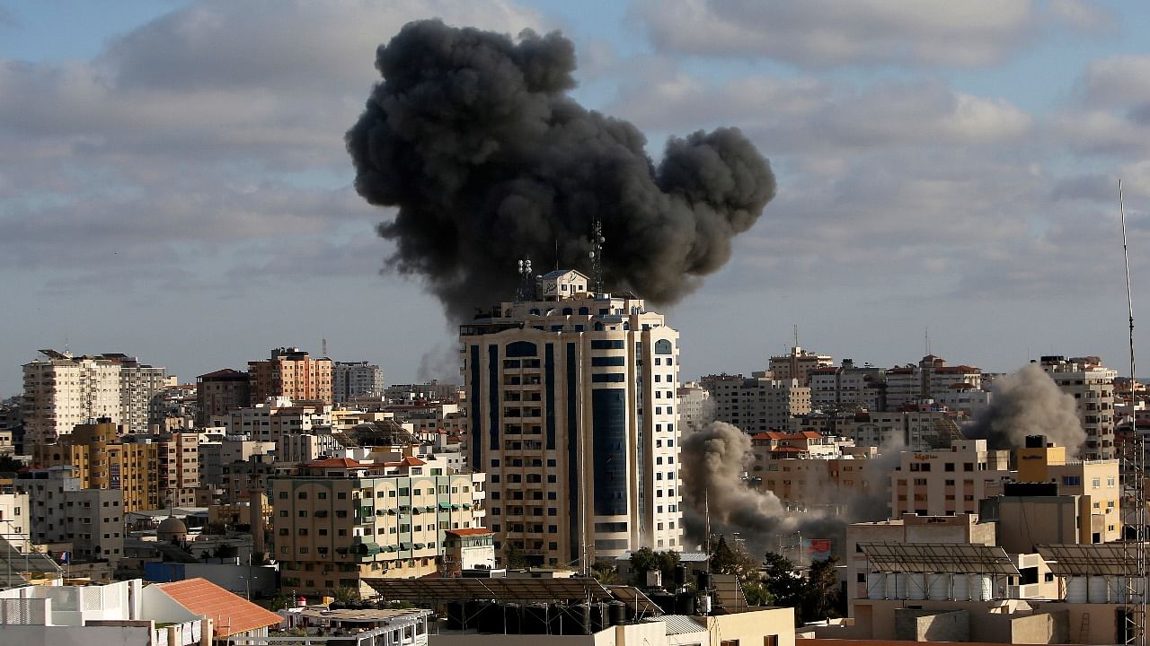 An Israeli air strike hits a building in Gaza City, Monday, May 17, 2021. Credit: AP/PTI Photo