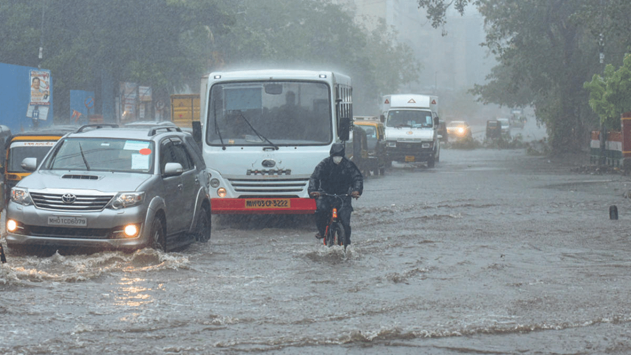 Heavy rain due to cyclone Tauktae leads to water logging at Sahar road in Andheri. Credit: PTI Photo