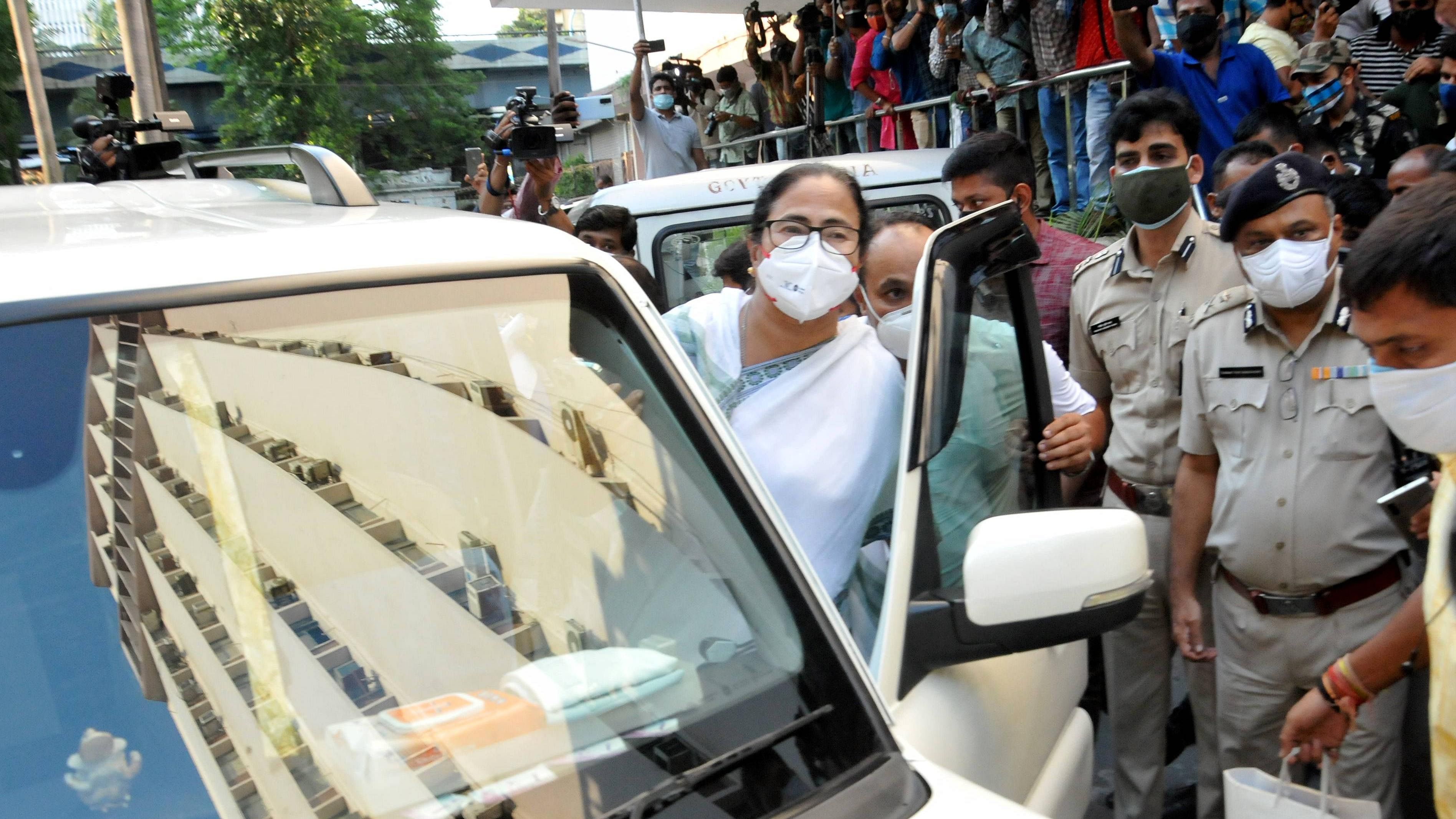 West Bengal CM Mamata Banerjee leaves the CBI office at Nizam Palace where she had come following the arrest of TMC ministers and MLAs in a scam case, in Kolkata, Monday. Credit: PTI