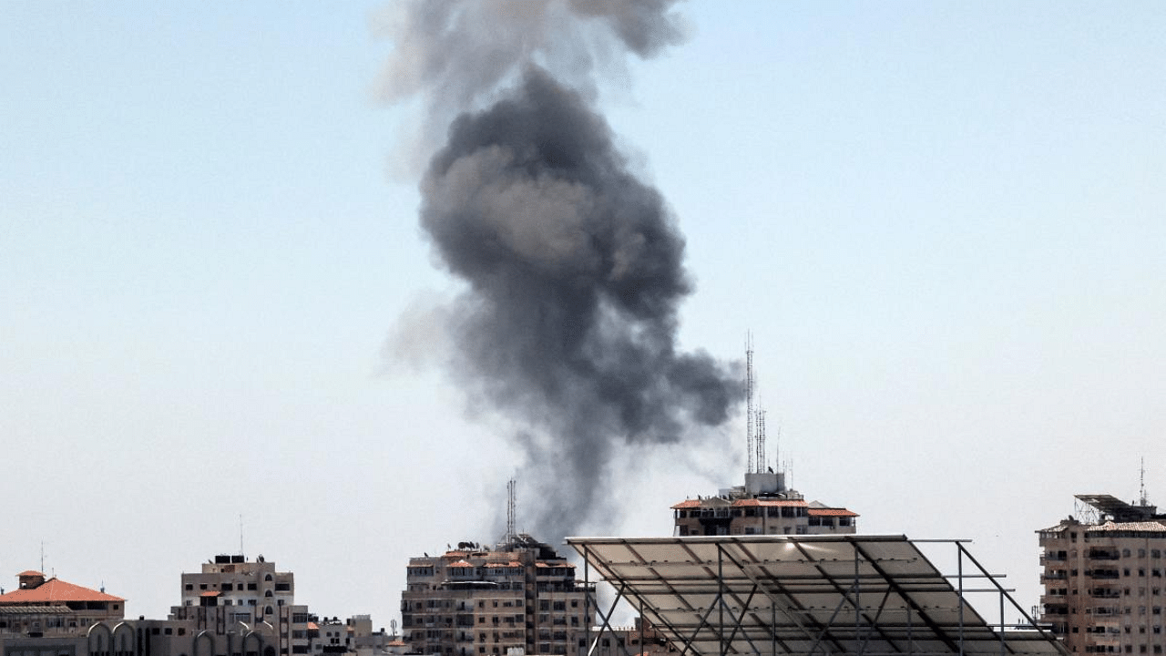 Smoke billows from an Israeli air strike in Gaza City. Credit: AFP Photo