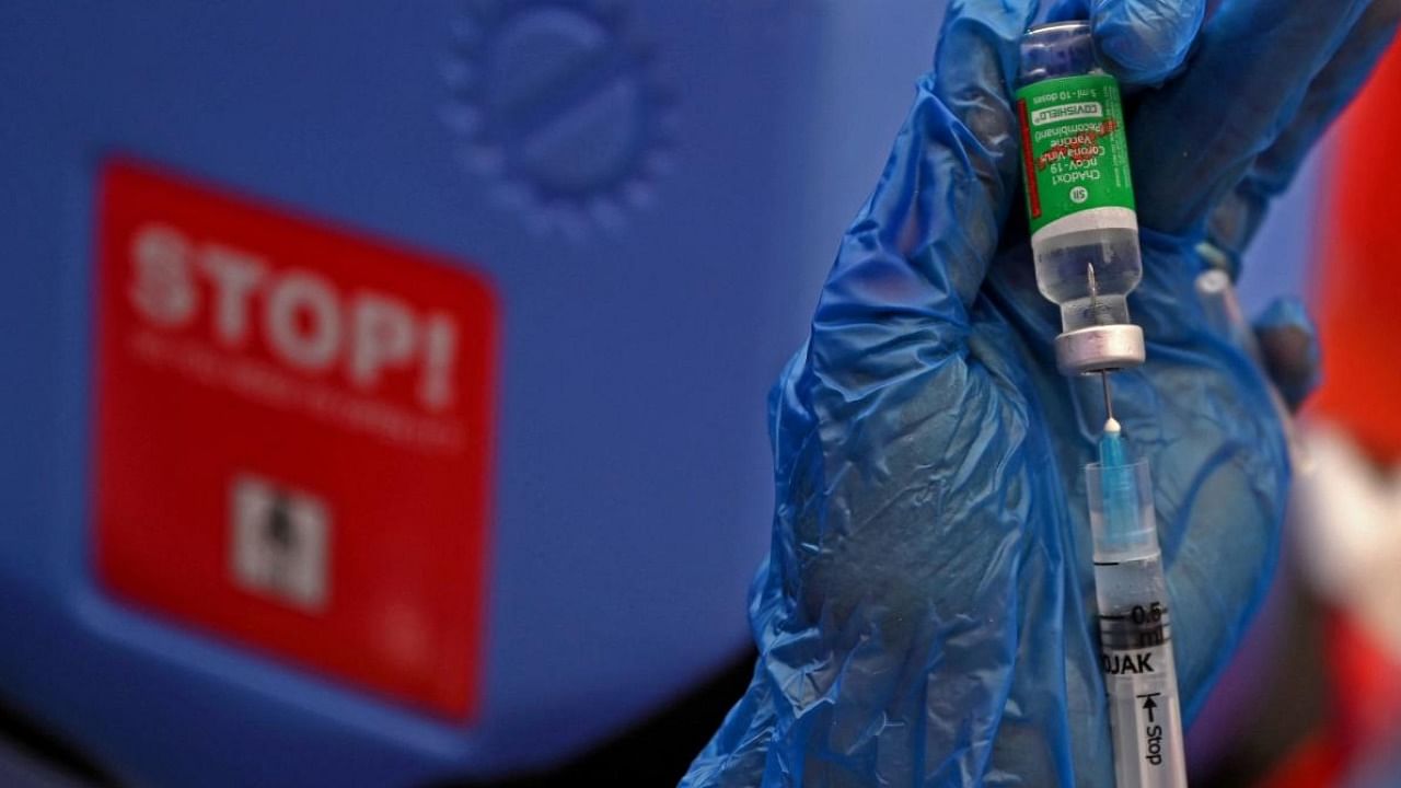 A health worker prepares the jab of the Covishield' Covid-19 coronavirus vaccine at a vaccination camp held in a residential area in Chennai. Credit: AFP Photo