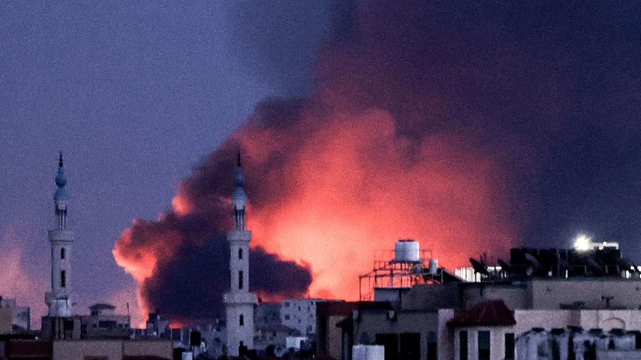 Smoke billows following an Israeli air strike on Gaza City. Credit: AFP Photo