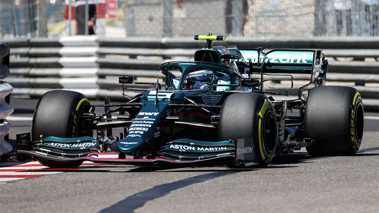 Aston Martin's German driver Sebastian Vettel drives during the second practice session at the Monaco street circuit in Monaco. Credit: AFP Photo