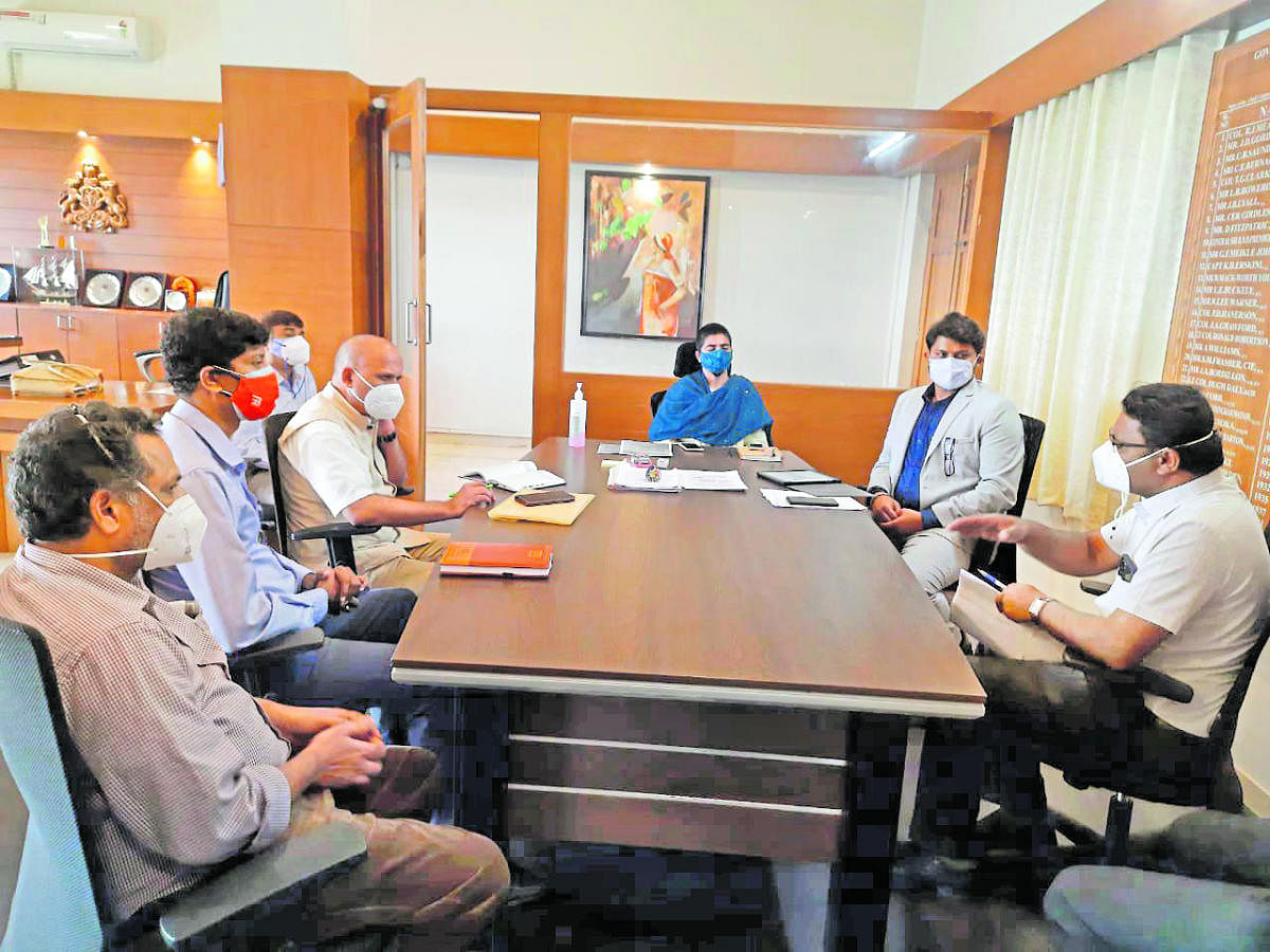 Deputy Commissioner Charulata Somal chairs a meeting on the formation of a district-level Covid-19 task force committee, at her office in Madikeri.