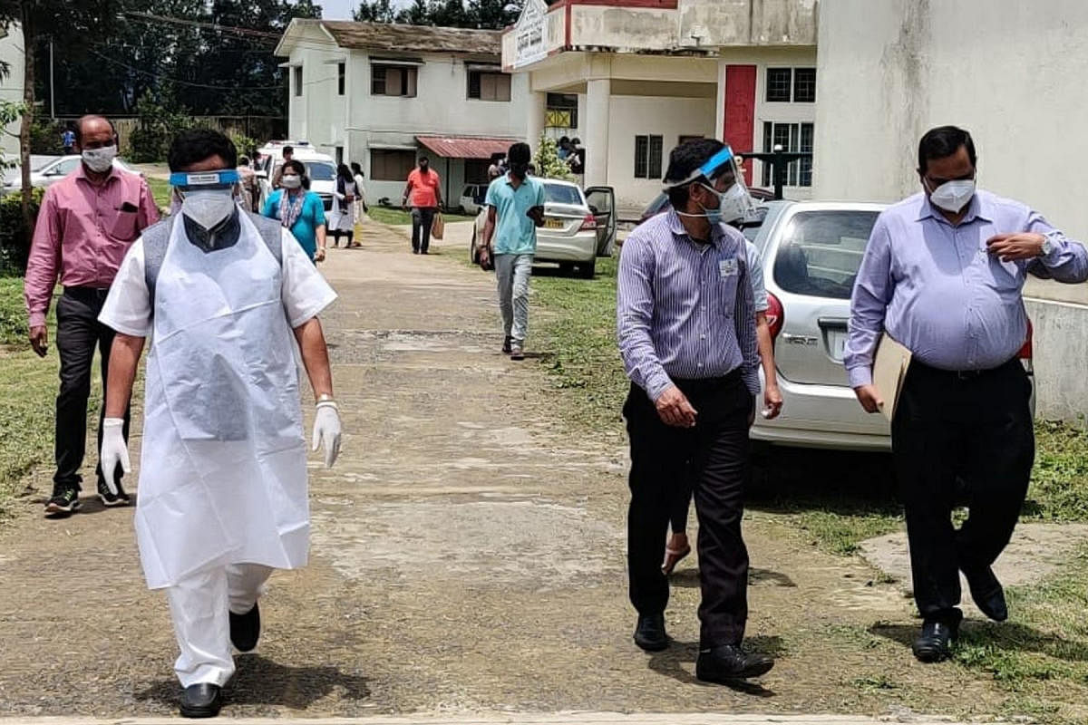 MLA K G Bopaiah visits the Covid Care Centre in Balugodu.