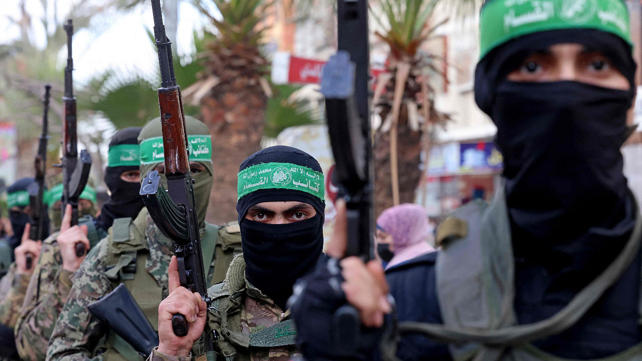 Members of Al-Qassam brigades, the armed wing of Palestinian Hamas group, march in Gaza City. Credit: AFP Photo