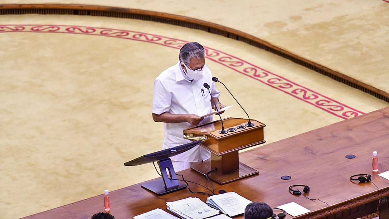 Kerala CM Pinarayi Vijayan takes oath as a member of the 15th Kerala Legislative Assembly. Credit: PTI Photo