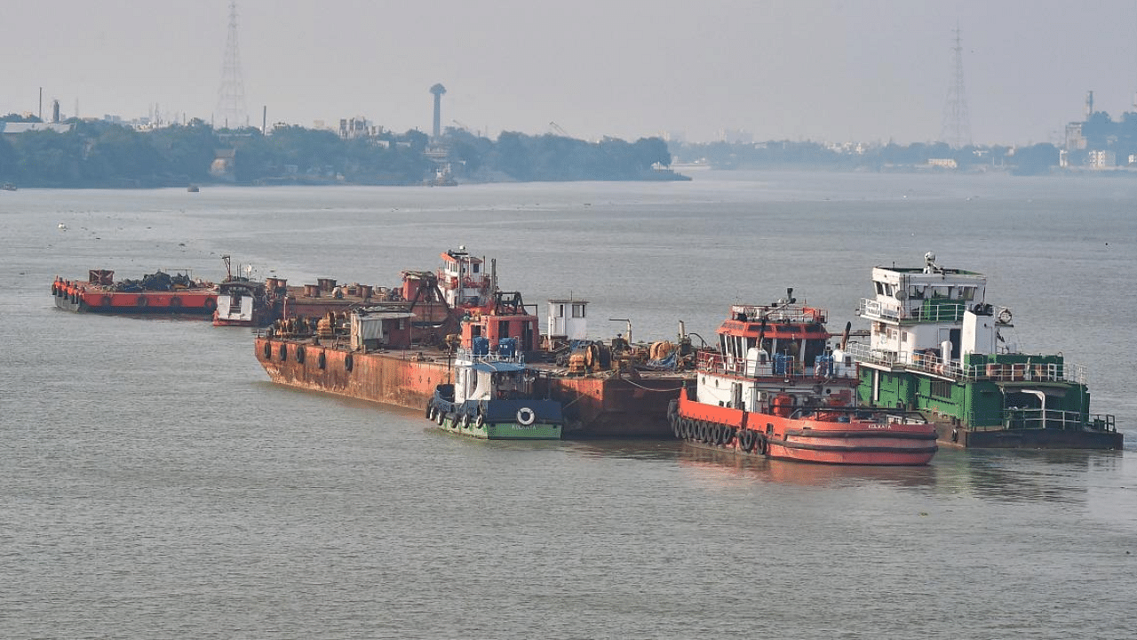 Vessels anchored in River Ganga during the ongoing Covid-induced lockdown and as a part of the preparation for Cyclone 'Yaas' in Kolkata. Credit: PTI Photo