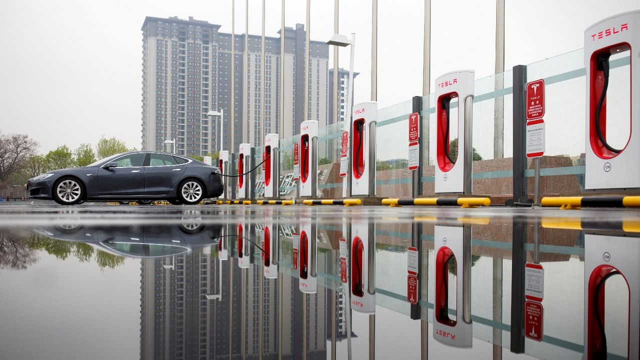 A Tesla car pictured at a charging point in Beijing. Credit: Reuters File Photo