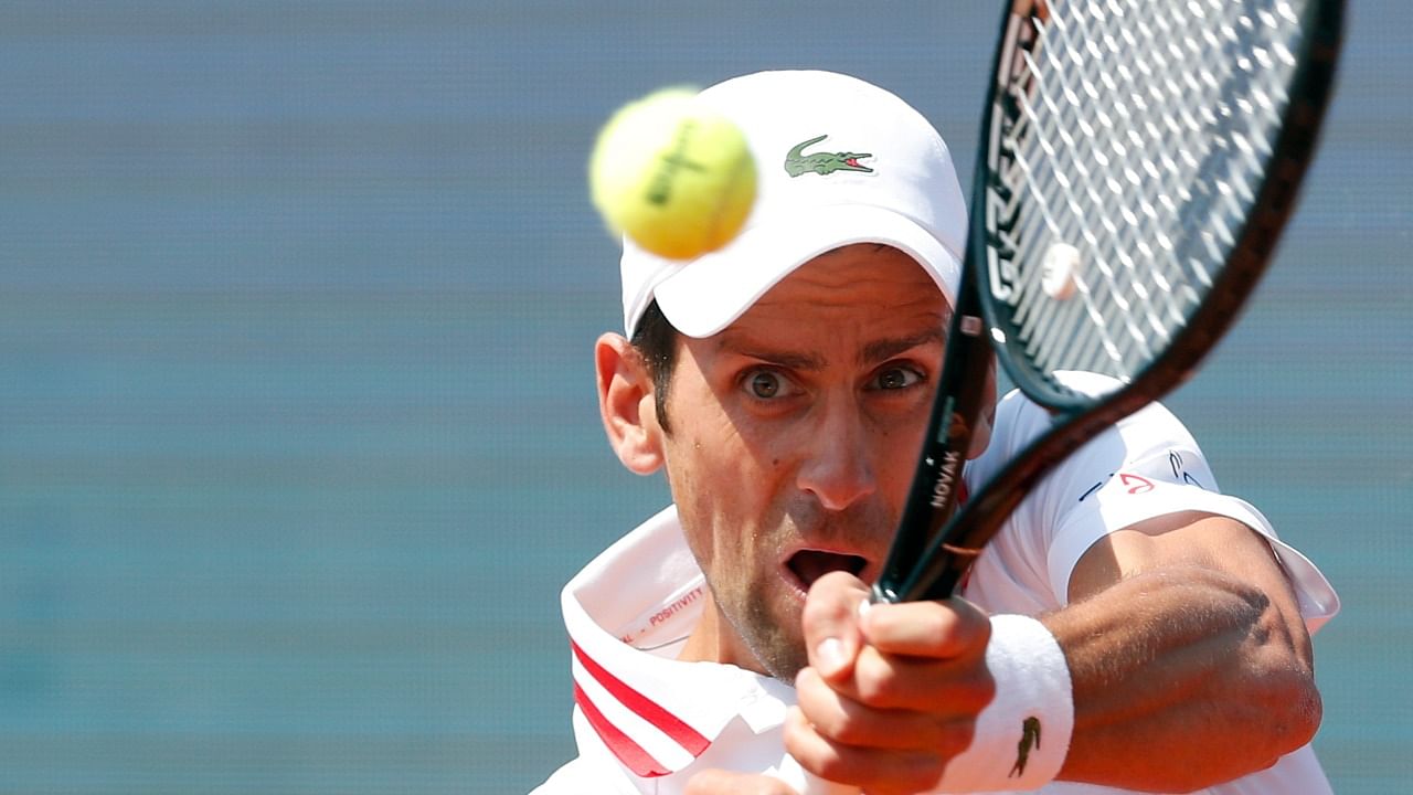 Novak Djokovic of Serbia returns a ball to Mats Moraing of Germany during their tennis match of the Belgrade Open tennis tournament in Belgrade, Serbia. Credit: AP/PTI Photo