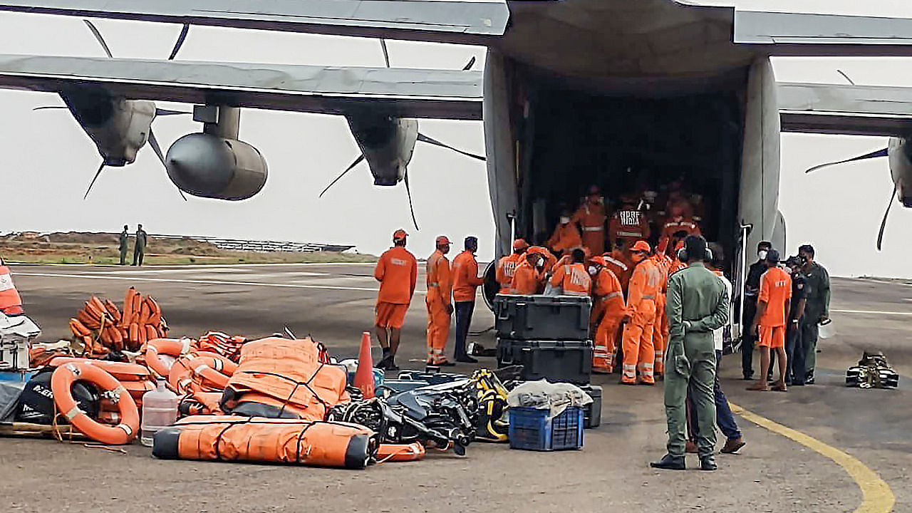 An IAF plane transports NDRF personnel to Odisha in preparation for Cyclone Yaas. Credit: PTI Photo