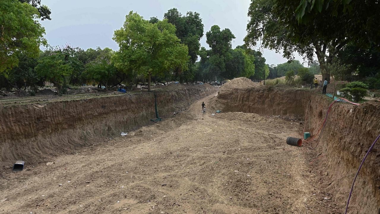 The site of a redevelopment work of the Central Vista Avenue by Central Public Works Department (CPWD) is pictured along the Rajpath road in New Delhi. Credit: AFP File Photo