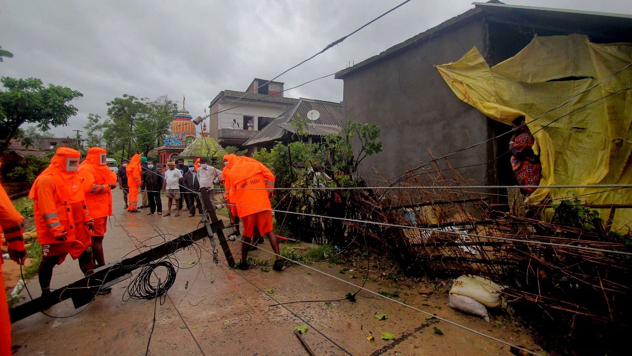 NDRF team engage in restoration work during cyclone Yaas landfall, in Balasore, Wednesday, May 26, 2021. Credit: PTI Photo