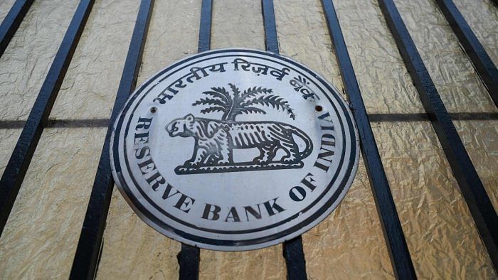 The logo of the Reserve Bank of India (RBI) is pictured on the gate of the bank's headquarters in Mumbai on May 5, 2021. Credit: AFP File Photo