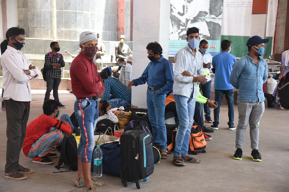 Afraid of being stranded, like they were last year, many migrant workers returned home before the lockdown came into effect. DH Photo by S K Dinesh