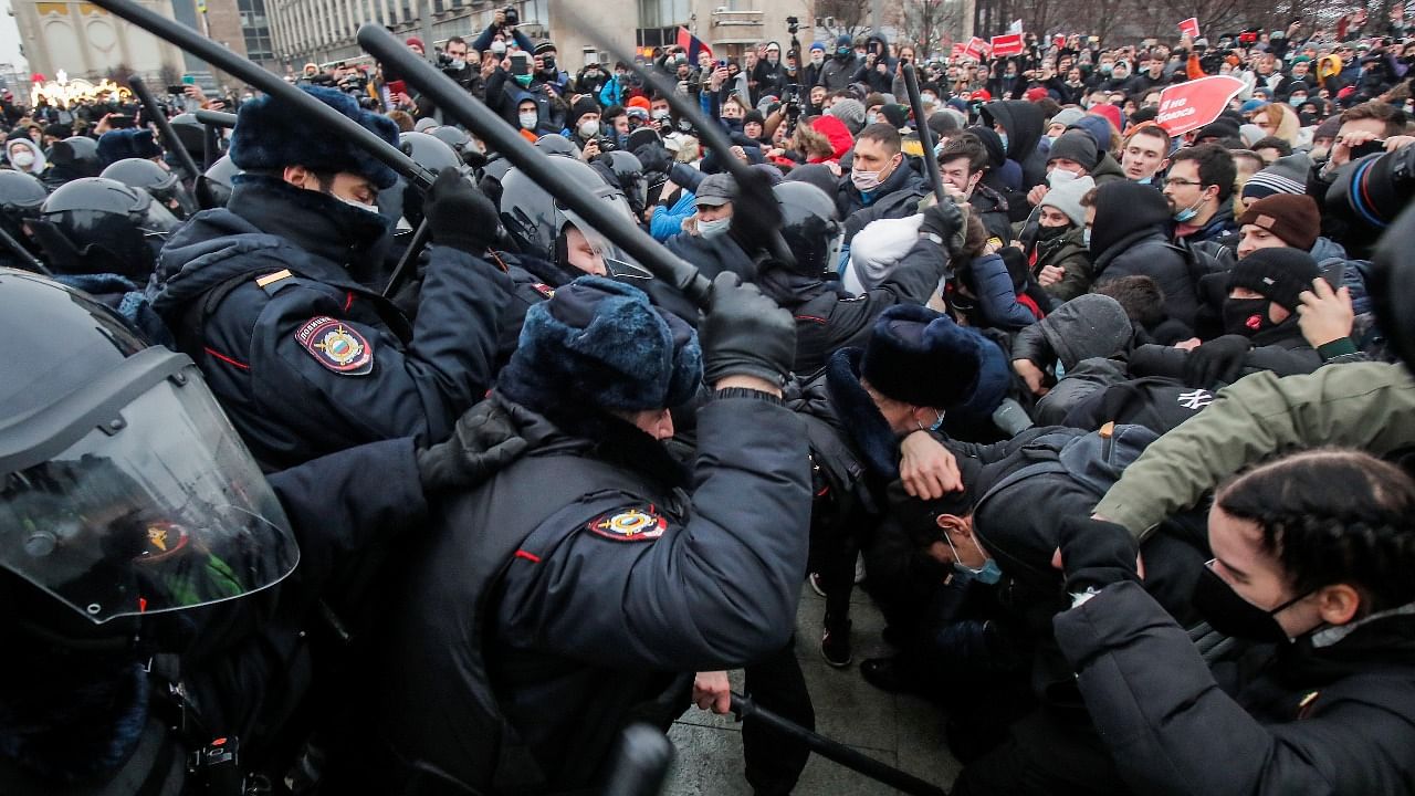 Law enforcement officers clash with participants during a rally in support of Alexei Navalny in Moscow earlier this year. Credit: Reuters file photo