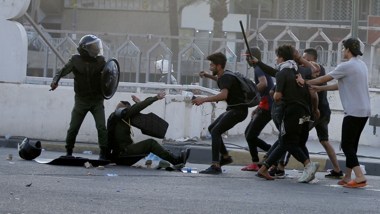 Two Iraqis were killed during demonstrations by thousands of people in Baghdad. Credit: Reuters Photo