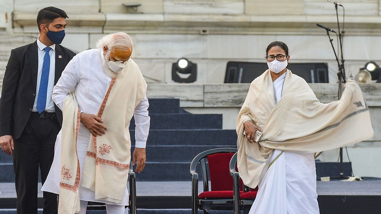 Prime Minister Narendra Modi with West Bengal Chief Minister Mamata Banerjee. Credit: PTI File Photo