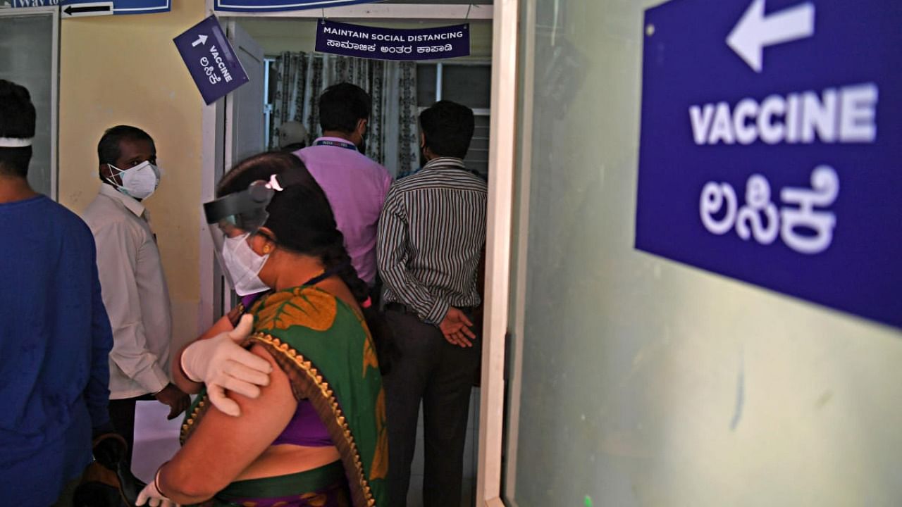 Covid vaccination is free in government hospitals but chargeable in private facilities. Credit: DH file photo