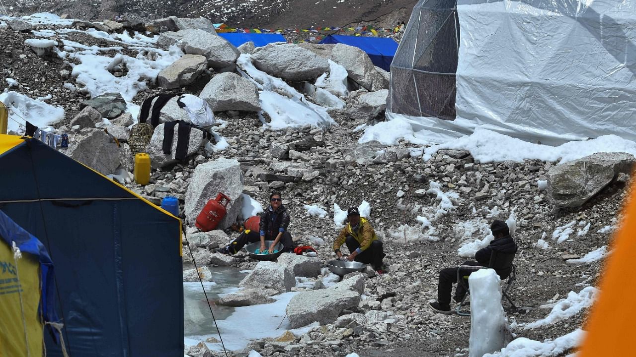 A total of 408 foreign climbers were issued permits to climb Everest this season, aided by several hundred Sherpas and support staff. Credit: AFP Photo