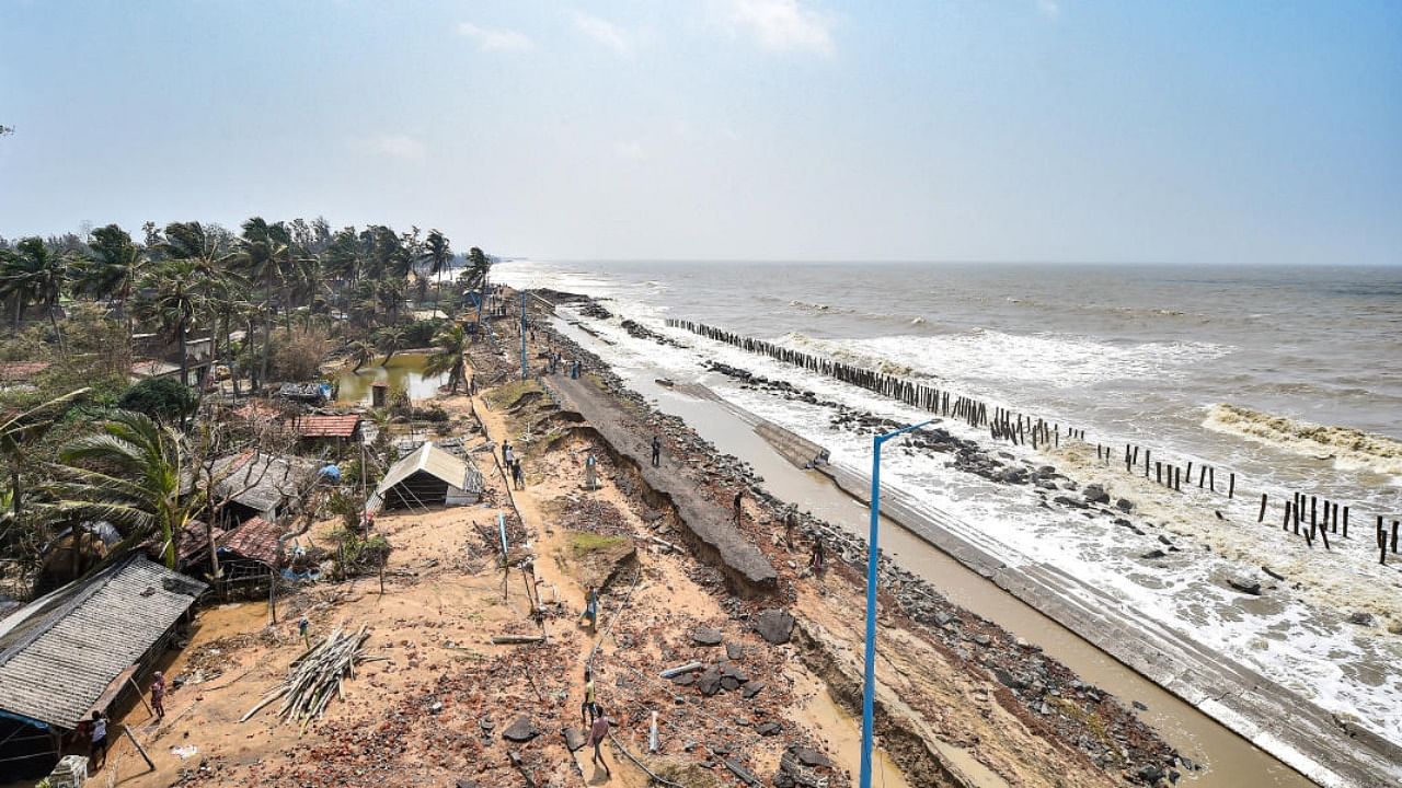 An eroded portion of a road along the coastal areas of Tajpur, in the aftermath of Cyclone 'Yaas', in East Midnapore district. Credit: PTI Photo