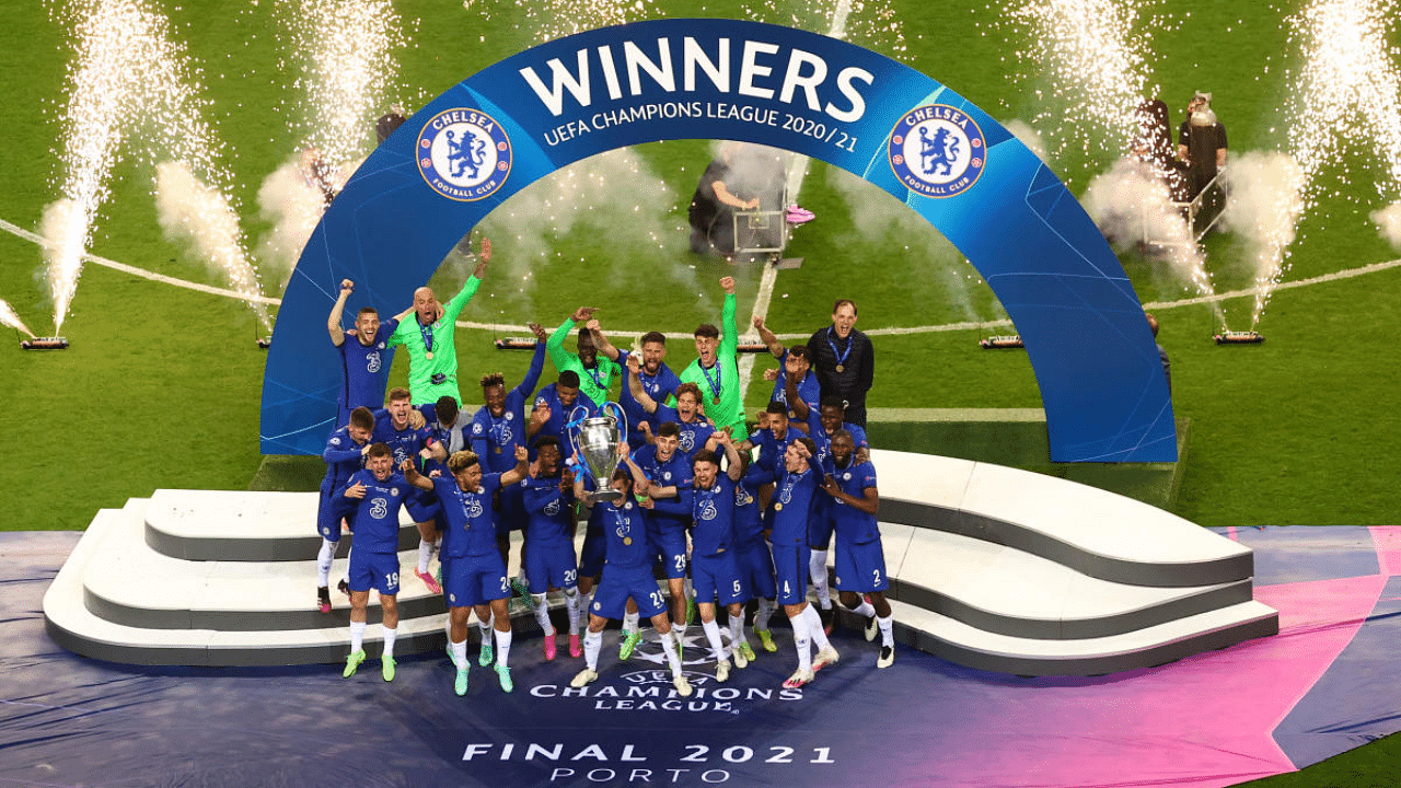 Chelsea players celebrate with the trophy. Credit: Reuters Photo