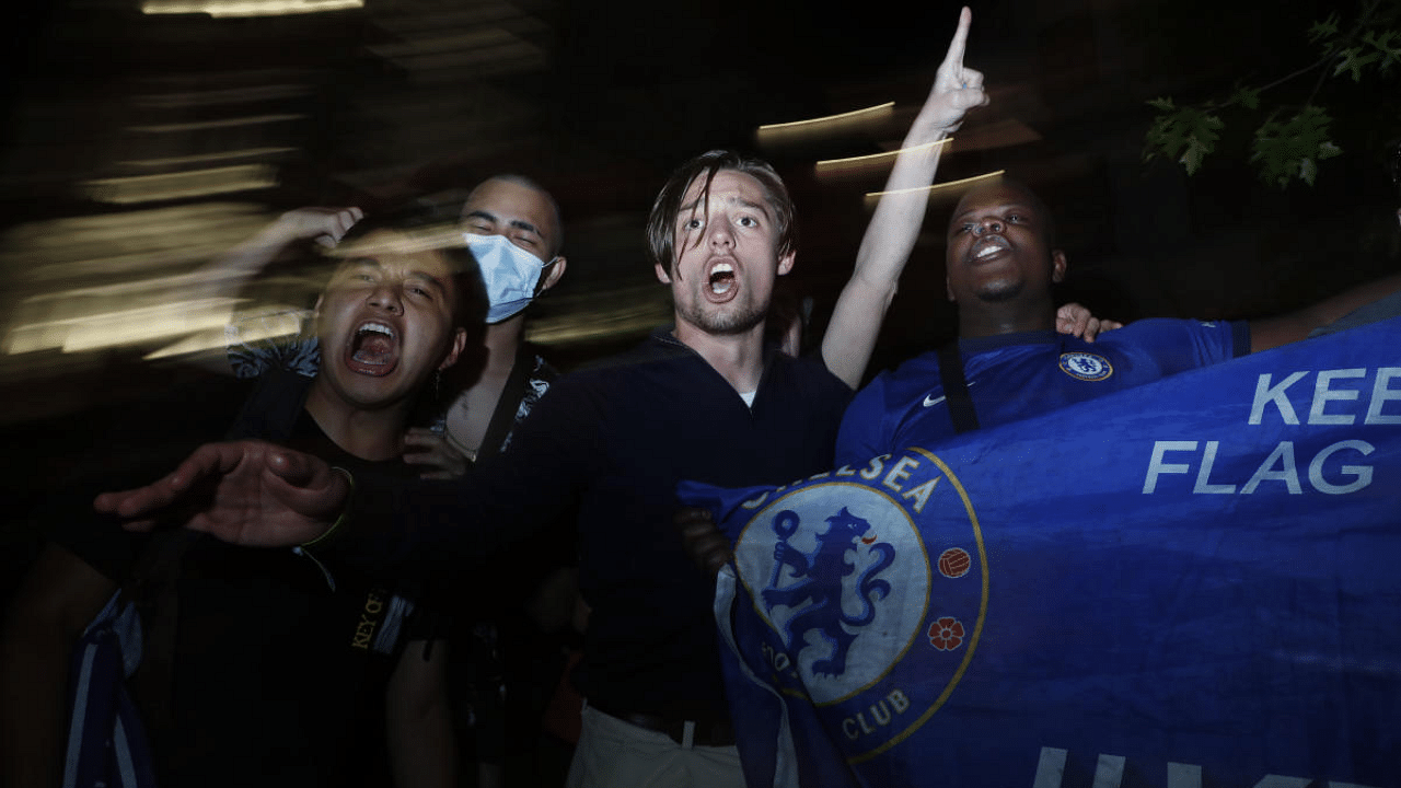 Chelsea fans celebrate winning the Champions League. Credit: Reuters Photo