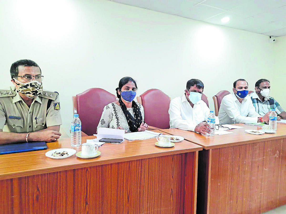 MLA M P Appachu Ranjan speaks at a meeting in Madikeri. Credit: DH Photo