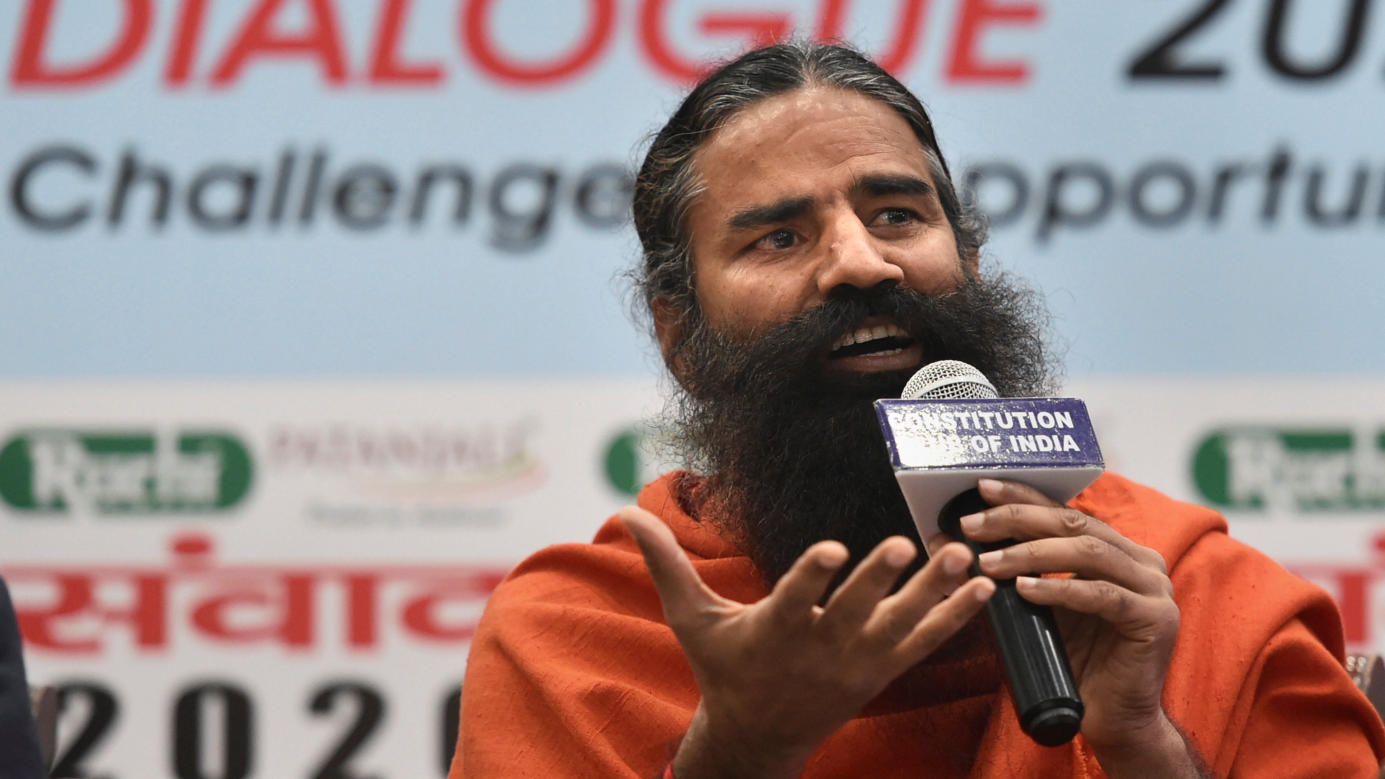 Ramdev’s antagonistic remarks on modern medicine and his allegation that modern medical methods had led to the deaths of lakhs due to Covid have generated huge controversy and invited a defamation notice from the IMA. Credit: PTI File Photo