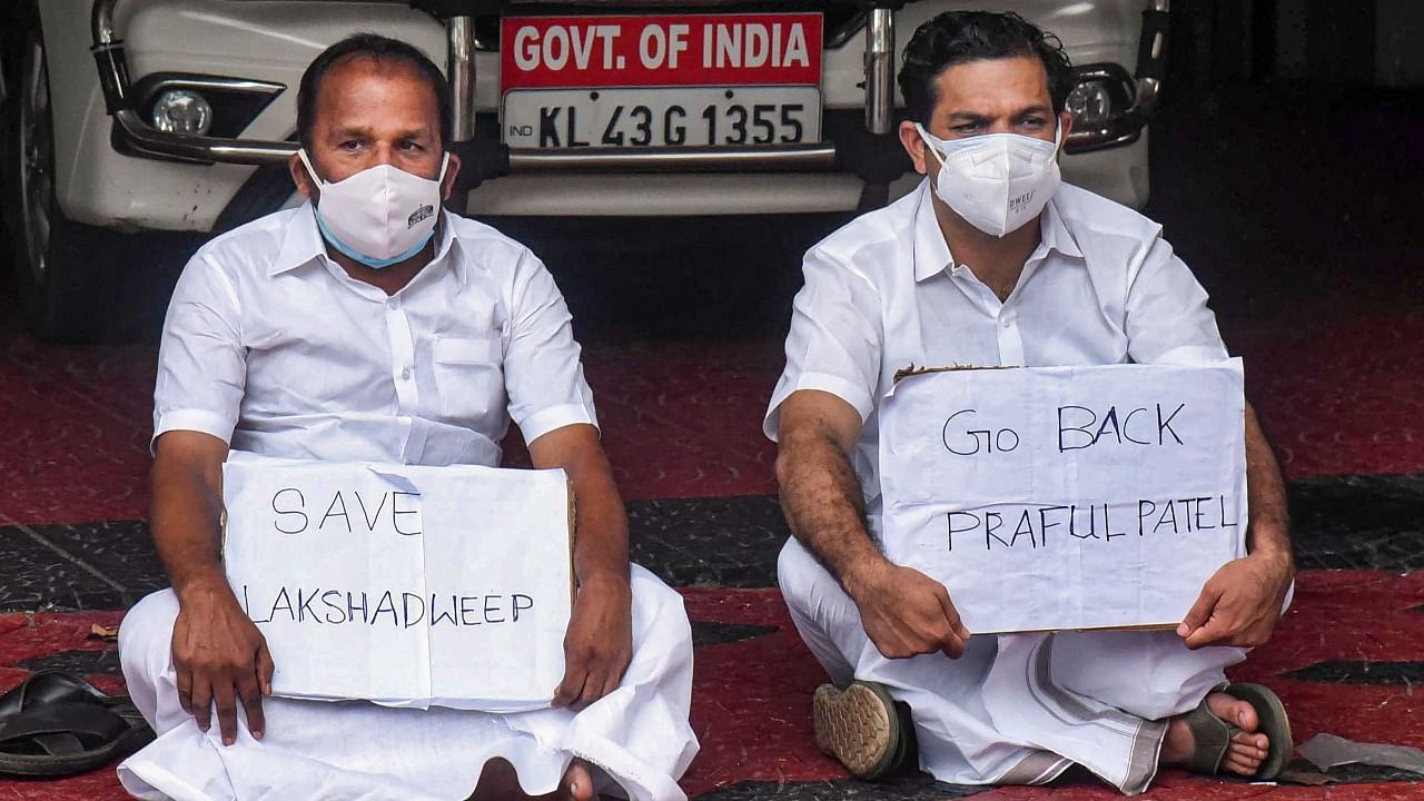 MPs Hibi Eden and TN Prathapan protest demanding the Indian president to urgently call back the administrator Praful Khoda Patel, in front of the Lakshadweep Administration office in Kochi, Wednesday, May 26, 2021. Credit: PTI Photo