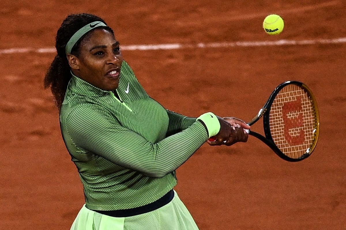 Serena Williams of the US returns the ball to Romania's Irina Begu during their women's singles first round tennis match at the court Philippe Chatrier on Day 2 of The Roland Garros 2021. Credit: AFP Photo