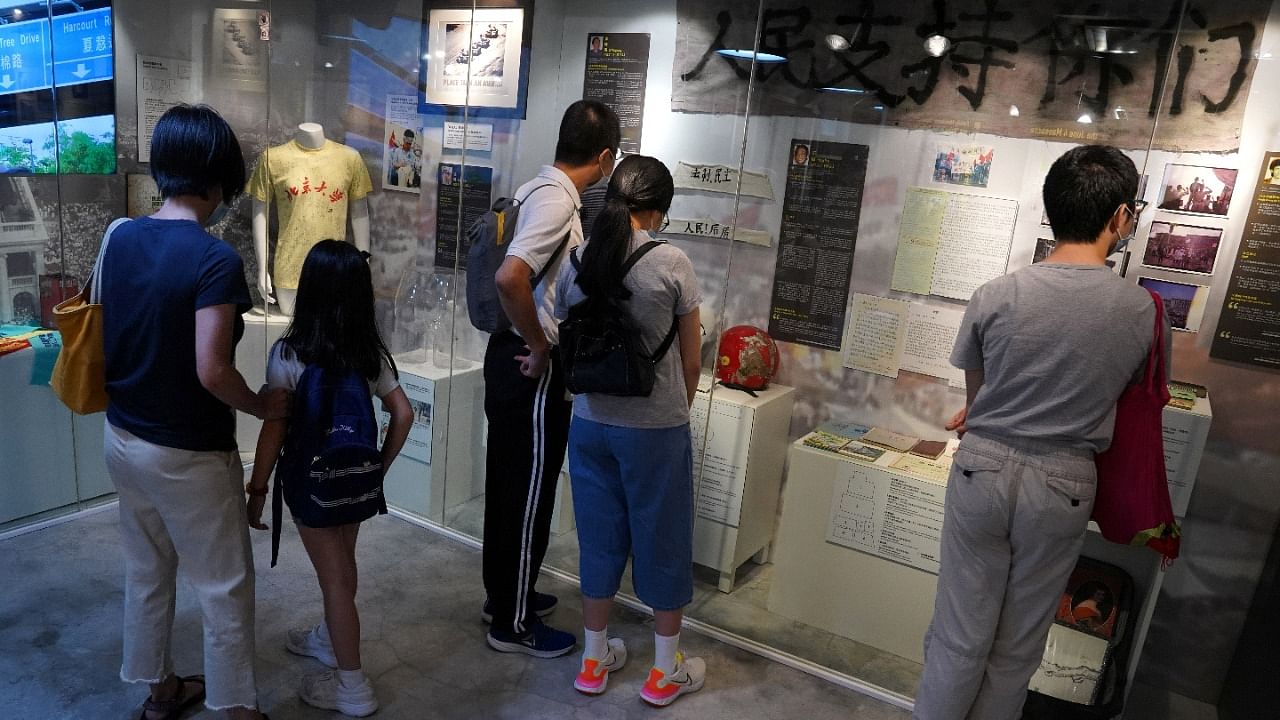 Visitors look at the exhibits displayed at the June 4th Museum, which commemorates the 1989 Tiananmen Square crackdown. Credit: Reuters File Photo