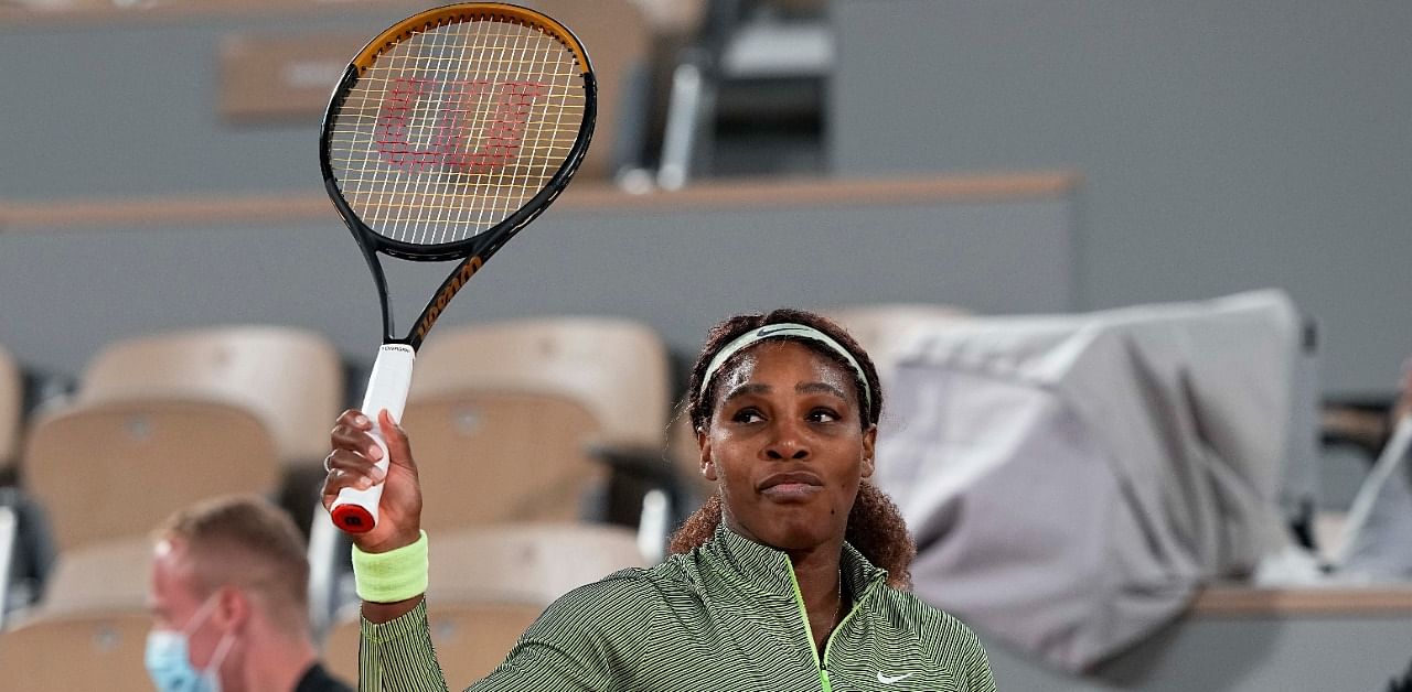 Serena Williams celebrates after defeating Romania's Irina-Camelia Begu. Credit: AP Photo