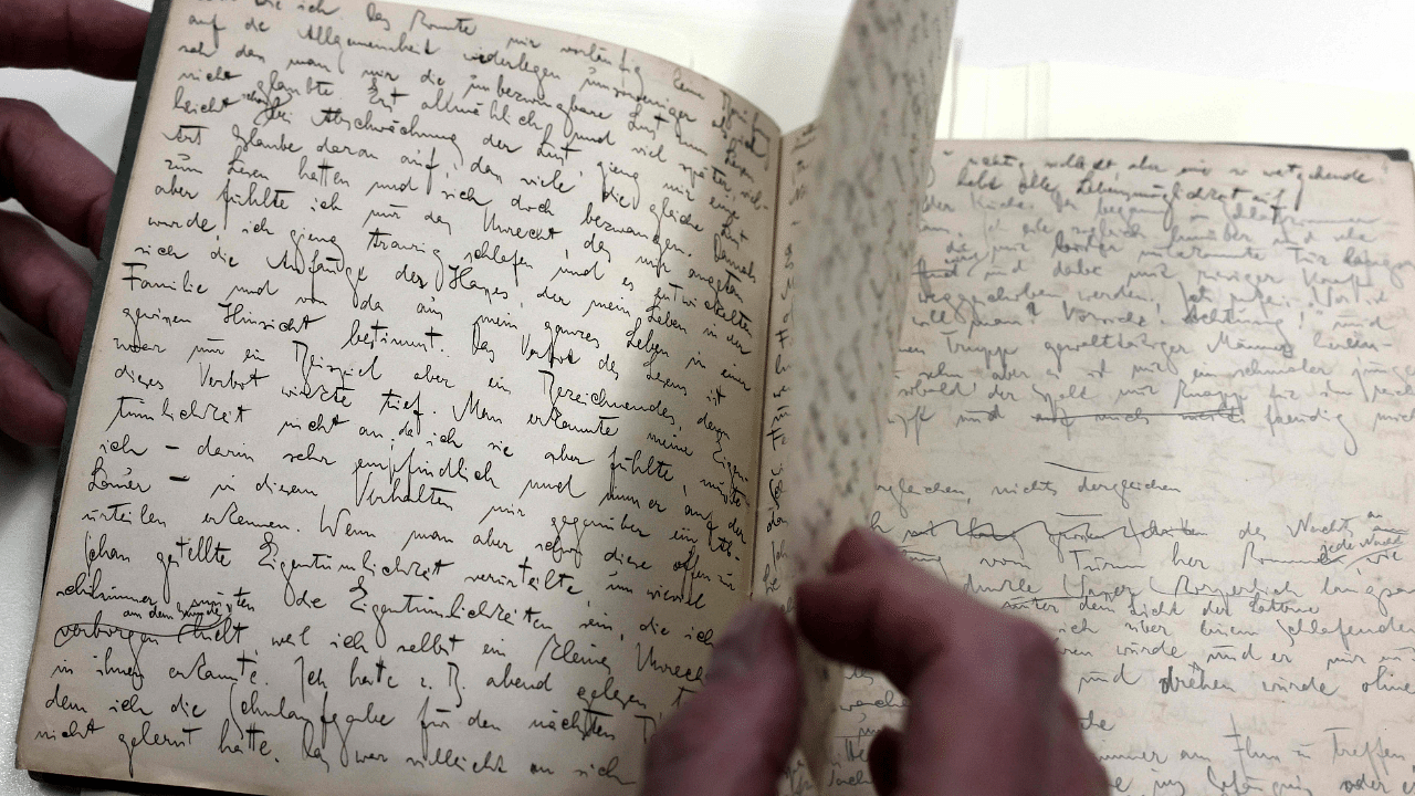 Original manuscripts written in German by Jewish German-speaking novelist and story writer Franz Kafka are displayed at the National Library of Israel in Jerusalem. Credit: AFP Photo