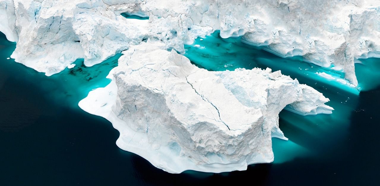 Aerial view of icebergs on Arctic Ocean in Greenland. Credit: iStock Photo