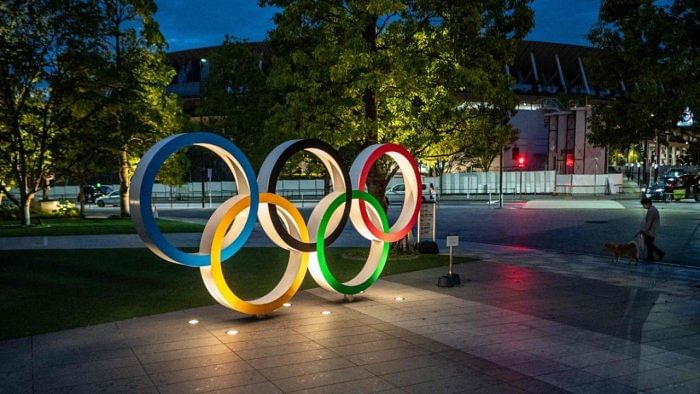 The Olympic rings are seen lit outside the Japan Olympic Museum in Tokyo. Credit: AFP Photo