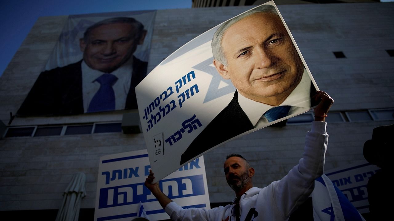 Supporters of Israeli Prime Minister Benjamin Netanyahu protest outside Likud Party headquarters in Tel Aviv. Credit: Reuters Photo