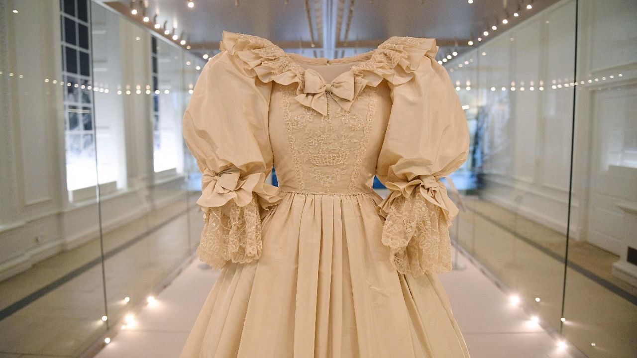 The wedding dress of Diana, Princess of Wales is seen on display at an exhibition entitled 'Royal Style in the Making' at Kensington Palace in London on June 2, 2021. Credit: AFP Photo