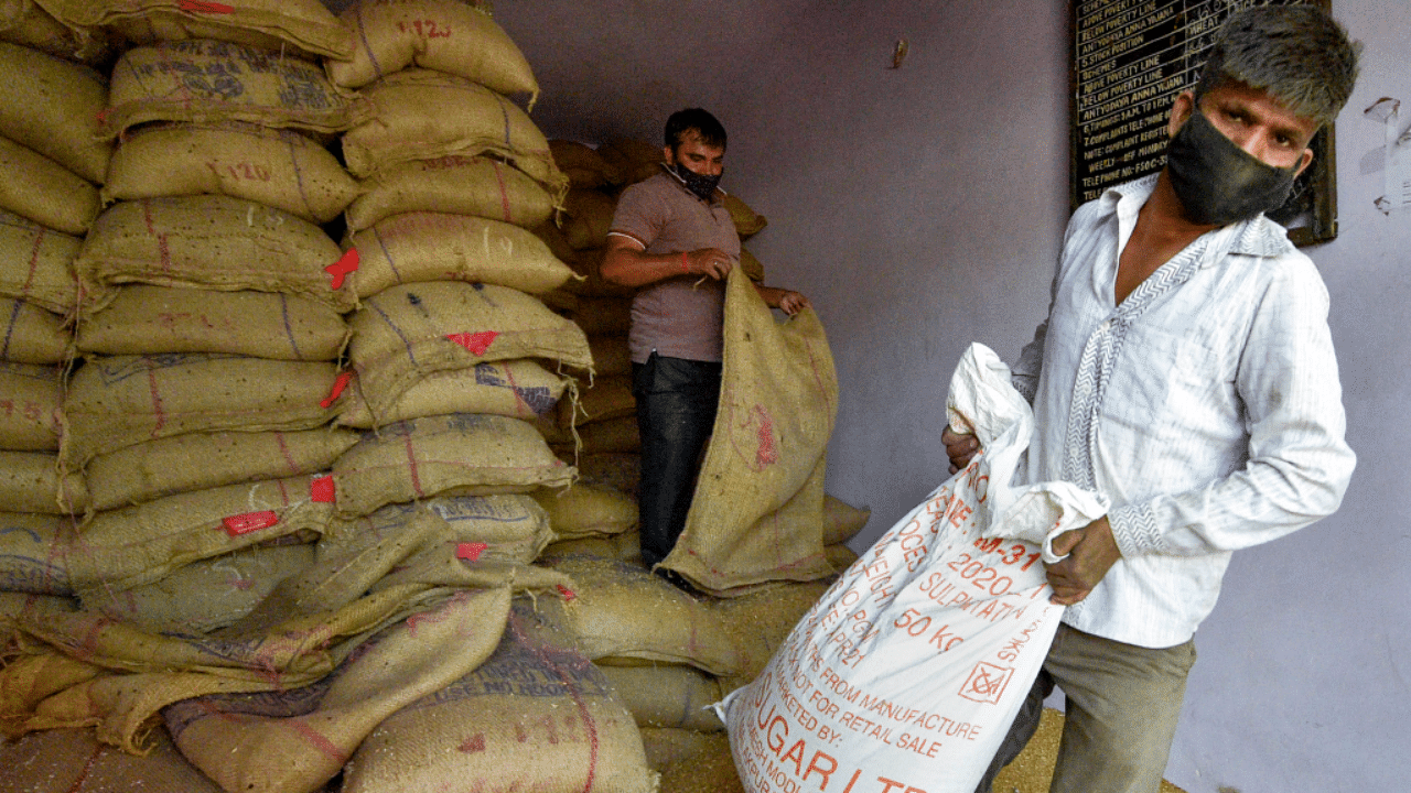 Additional grains were to be given under the Pradhan Mantri Garib Kalyan Anna Yojana (PMGKAY) via ration shops or Public Distribution System. Credit: PTI Photo