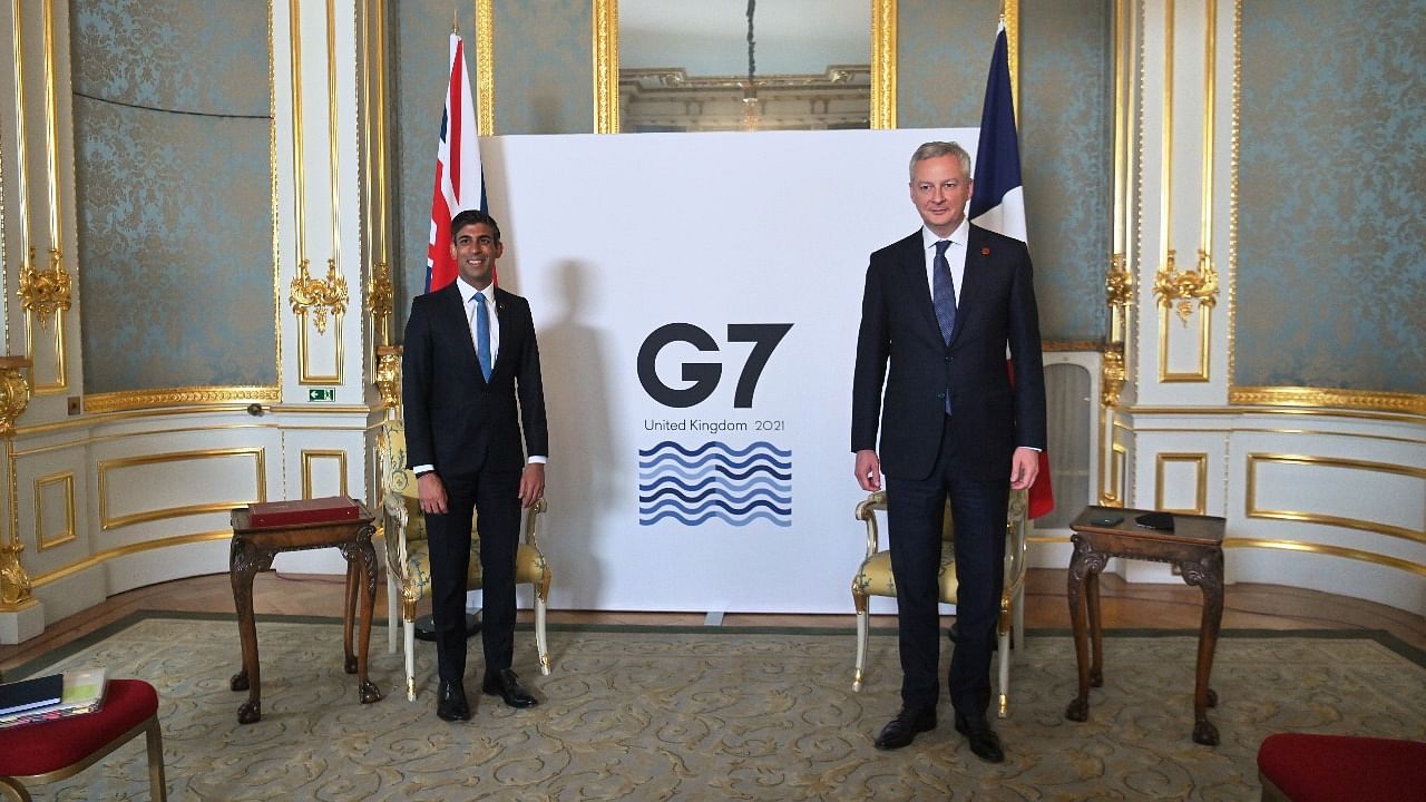 Britain's Chancellor of the Exchequer Rishi Sunak poses with France's Economy and Finance Minister Bruno Le Maire at a meeting of finance ministers from across the G7 nations ahead of the G7 leaders' summit, at Lancaster House in London. Credit: Reuters photo
