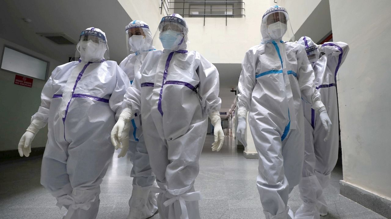 Nurses head for a week long duty inside Covid-19 wards, at Ramaiah Medical College Hospital in Bengaluru, Friday, June 4, 2021. Credit: PTI Photo